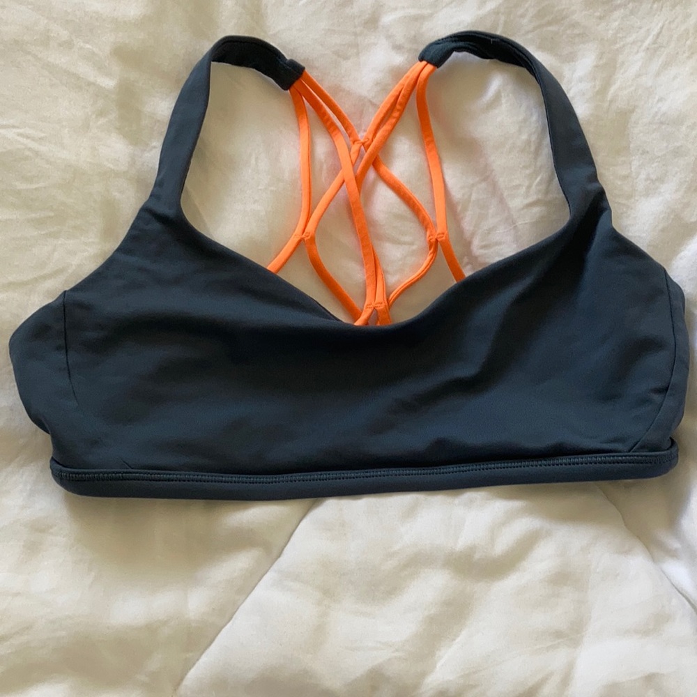Strappy lululemon sports bra. Orange 🍊 accent